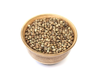 hemp seed in a bowl on a white background