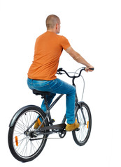 back view of a man with a bicycle. cyclist rides a bicycle. Rear view people collection.  backside...