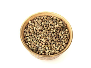 hemp seed in a bowl on a white background