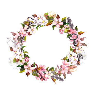 Floral wreath with spring flowers, keys. Watercolor round border
