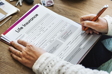 Naklejka premium Life Insurance Form Application Security Concept