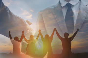 Double expolsure of business success concept in sunset