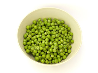 frozen peas in a bowl on a white background