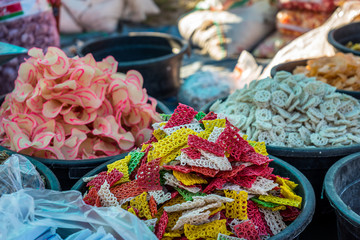 Raw Krupuk. Raw Krupuk for sale at a traditional Indonesian market in Lombok, near Senaru. Krupuk krackers are made from fish or seafood and deep fried.