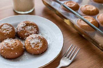 Turkish Dessert Sekerpare with coconut powder / Small cakes with sherbet