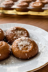 Turkish Dessert Sekerpare with coconut powder / Small cakes with sherbet