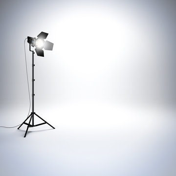 White empty photo studio with professional flashlight.