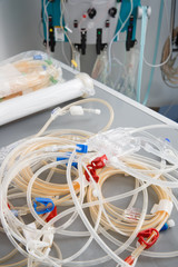 Blood tubes with hemodialysis machine in the background