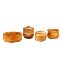 Vintage wooden containers for spices on a white background.