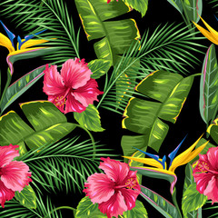 Naklejka premium Seamless pattern with tropical leaves and flowers. Palms branches, bird of paradise flower, hibiscus