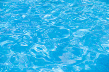 Fototapeta na wymiar Clear blue water in pool