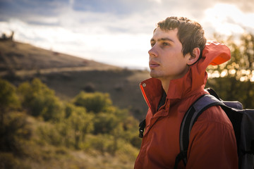 Man in mountain at sunset