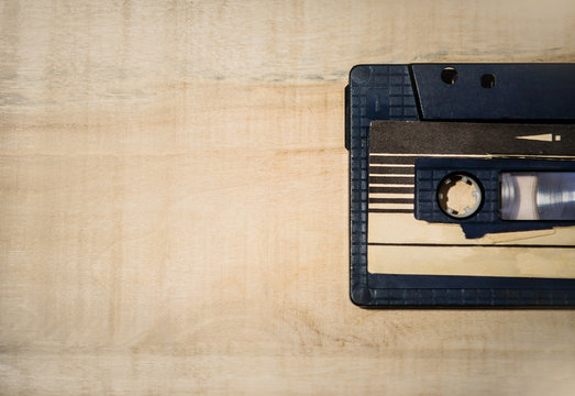 сassette tape recorder on the wooden table