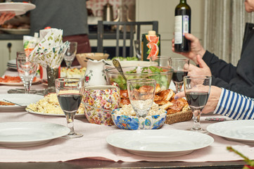 Big family at festive table at home