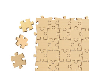 Wooden puzzles wall with some pieces falling