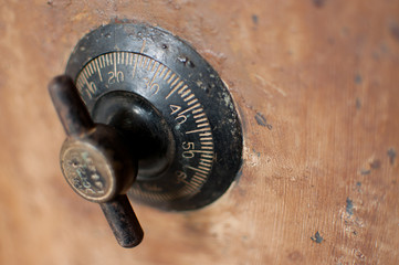 Close up of old safe combination dial