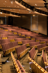 Spacious lecture room with wooden seats