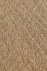 texture of wet sand with a pattern view from above. Wet sand with abstract pattern