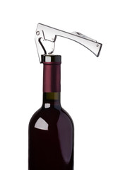 Bottle of red wine and corkscrew