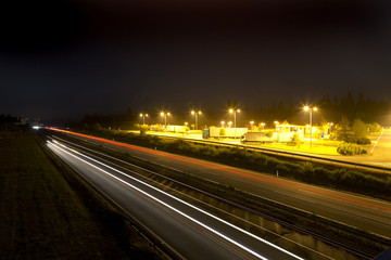 Fototapeta na wymiar parking place at night near highway