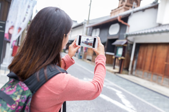 Woman taking photo in nagahama city