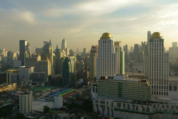 Fototapeta na wymiar Aerial view of Bangkok modern office buildings, condominium in B