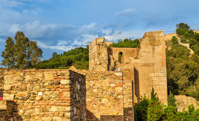 Stone walls and towers of the Alcazaba Fortress in Malaga. Spain. Andalusia.