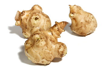 Jerusalem Artichoke Roots or Topinambur on a White Background