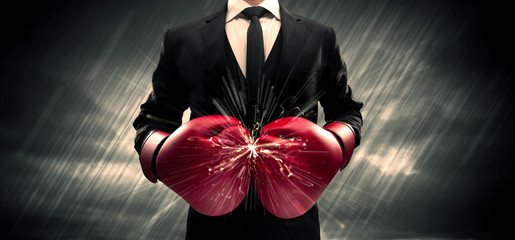 Boxing gloves clashing