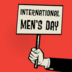 Poster in hand, business concept with text International Man's D