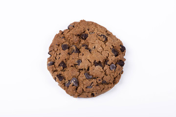 Tasteful cookie lying on a clear white surface. Horizontal studio shot.