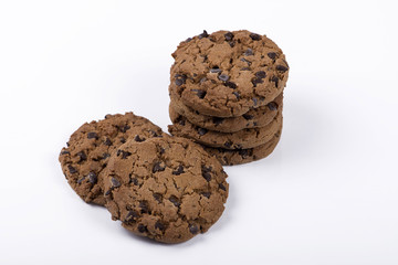 Tastefuls cookie lying on a clear white surface. Horizontal studio shot.