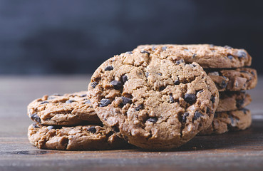Delicious cookies placed on wooden table. Horizontal studio shot.