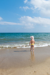 baby on the sand beach