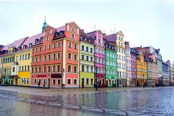 Many colorful buildings on city square