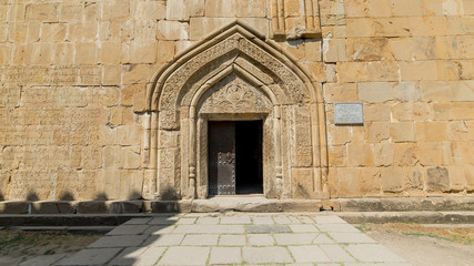 Ananuri, Georgia - August 5, 2015: The entrance door to Ananuri, a church and castle complex from Georgia