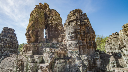 Naklejka premium Siem Reap, Cambodia, December 06, 2015: The many face temple of Bayon at the Angkor Wat site in Cambodia