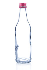 Empty glass bottle on white background