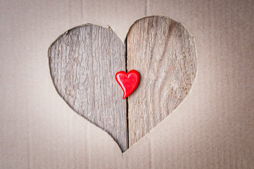Heart shapes on wooden background