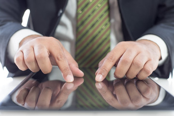 Businessman touching tablet for business concept