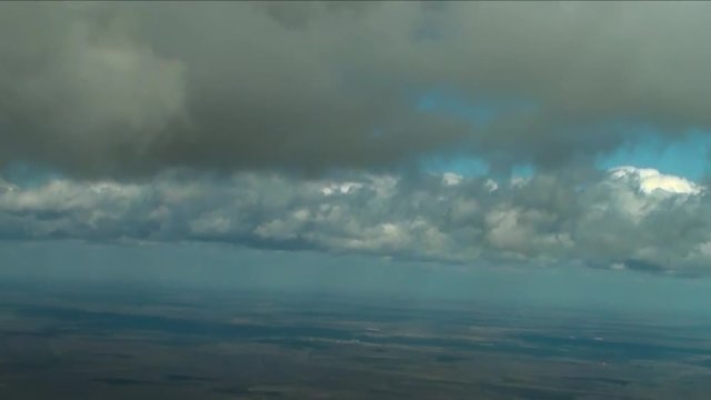 Flight under clouds
