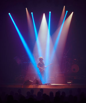 Guitarist performing on stage. Concert.