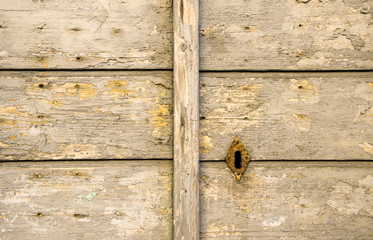 Details of an old wooden door in Florence,Tuscany, Italy.