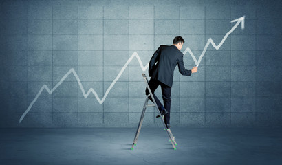 Man drawing line from ladder