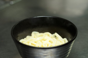 Japan hot udon noodle in bowl wait hot soup with dried fish