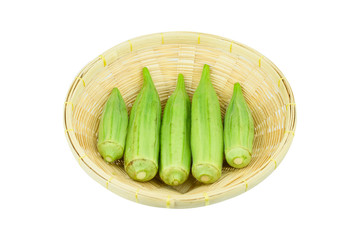 Fresh young okra in .Bamboo Basket isolated on white background