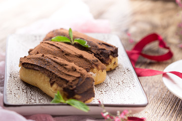 Obraz na płótnie Canvas Eclairs (dessert) for valentines day