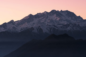 Fototapeta na wymiar Monte Rosa mountain (Italian Alps) seen from Valsesia in winter at sunset
