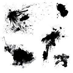 Set of black blots and ink splashes isolated on white background