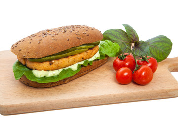 Sandwich on a chopping board.